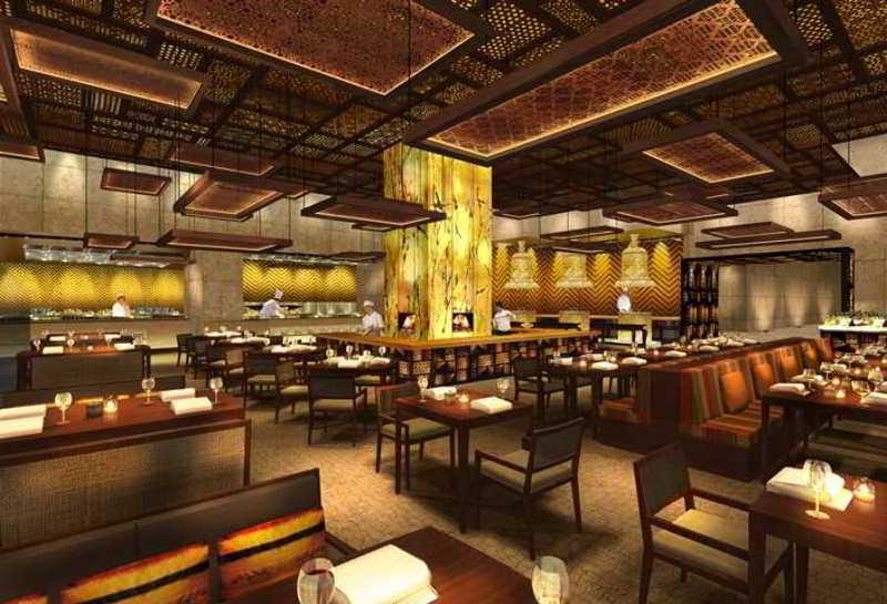 Hilton Jaipur Hotel Exterior foto The interior of the restaurant
