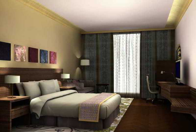 Hilton Jaipur Hotel Exterior foto A typical hotel room